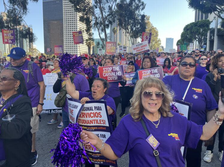 Thousands of participants cheer on speakers in a May 7 rally to oppose anticipated budget cuts outside the headquarters of the Los Angeles Unified School District, just west of downtown L.A.