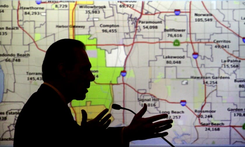 Ho, Lawrence K. –– B581350096Z.1 CULVER CITY, CA. JUN. 16, 2011. Jim Dear, Mayor of Carson giving his comments with the redistricting map behind him at the hearng. Public comments on the newly developed congressional redistricting map at Culver City Hall on Jun. 16, 2011.(Lawrence K. Ho/Los Angeles Times)