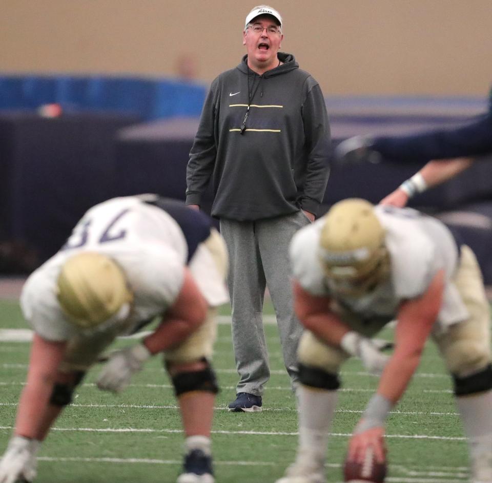 University of Akron head coach Joe Moorhead keeps an eye on the Zips during the team's Spring Game on Saturday April 30, 2022 in Akron, Ohio, at Stile Field House.