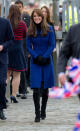 <p>For a day of events in Scotland. Kate appropriately chose Scottish designer Christopher Kane to create a bespoke royal blue coat. Her favourite heeled boots by Aquatalia finished the look as did a Stuart Weitzman clutch. </p><p><i>[Photo: PA]</i></p>