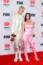 <p>Fox wore a pink Mach & Mach jumpsuit with silver straps and matching heeled pumps to create this <a href="https://www.elle.com/uk/life-and-culture/a36565497/megan-fox-machine-gun-kelly-pink-outfits-iheartradio-music-awards-2021/" rel="nofollow noopener" target="_blank" data-ylk="slk:Barbie-inspired look;elm:context_link;itc:0;sec:content-canvas" class="link ">Barbie-inspired look</a>. </p>