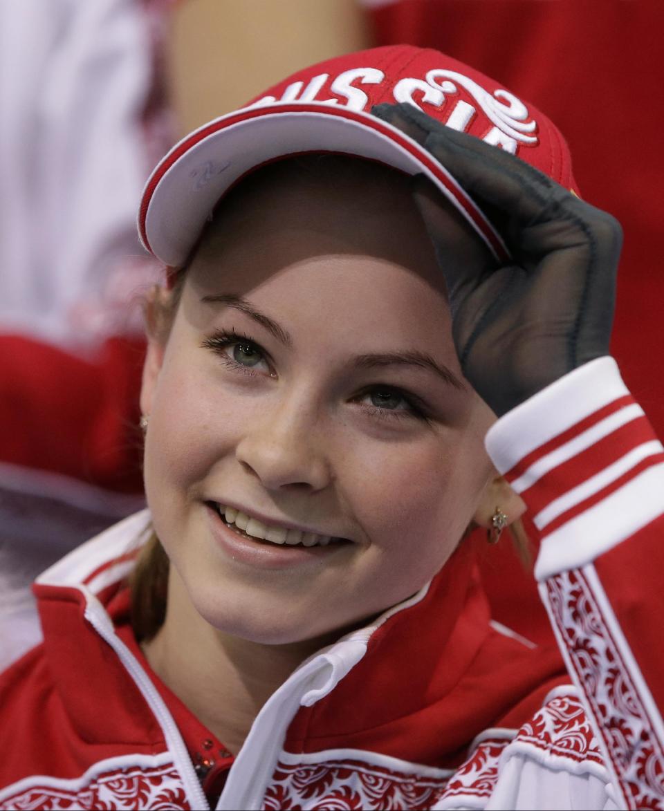 Julia Lipnitskaia of Russia waits in the results area after competing in the women's team free skate figure skating competition at the Iceberg Skating Palace during the 2014 Winter Olympics, Sunday, Feb. 9, 2014, in Sochi, Russia. (AP Photo/Darron Cummings, Pool)