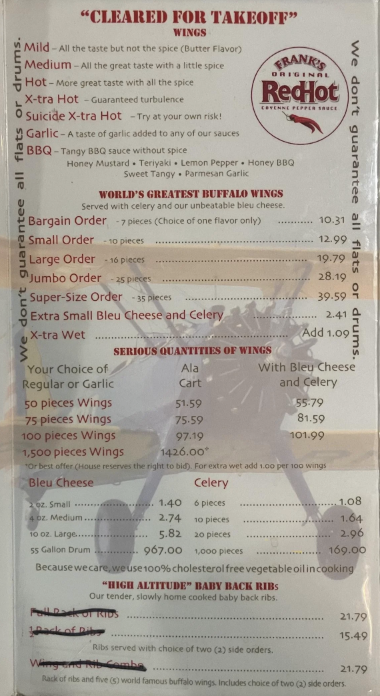 Menu displaying various sizes of chicken wings and side orders with prices