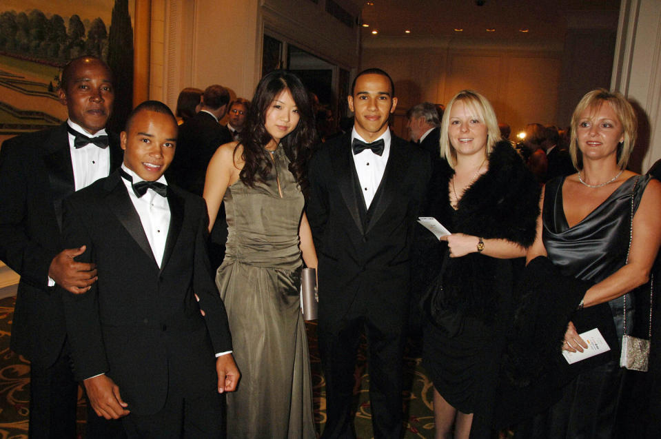 Lewis Hamilton poses with Jodia Ma and others at the AutoSport Magazine awards in 2006. (Dave Benett / Getty Images)