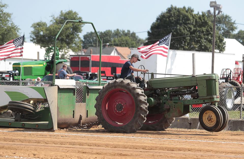 Rudy Pero of East Canton competes in the tractor pull at the 2021 Stark County Fair.