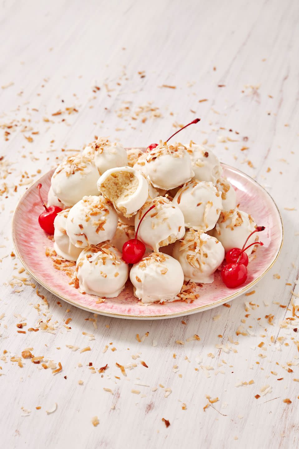 <p>Every partygoer can use a bite-sized escape to the tropics.<br></p><p>Get the recipe from <a href="https://www.delish.com/cooking/recipe-ideas/a28412273/pina-colada-truffles-recipe/" rel="nofollow noopener" target="_blank" data-ylk="slk:Delish;elm:context_link;itc:0;sec:content-canvas" class="link ">Delish</a>.</p>