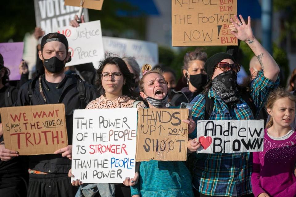 Demonstrators organize on Colonial Ave to march in Elizabeth City, NC on Thursday, April 22, 2021 in reaction to the death of Andrew Brown Jr., who was shot by a Pasquotank County Deputy Sheriff on Wednesday.