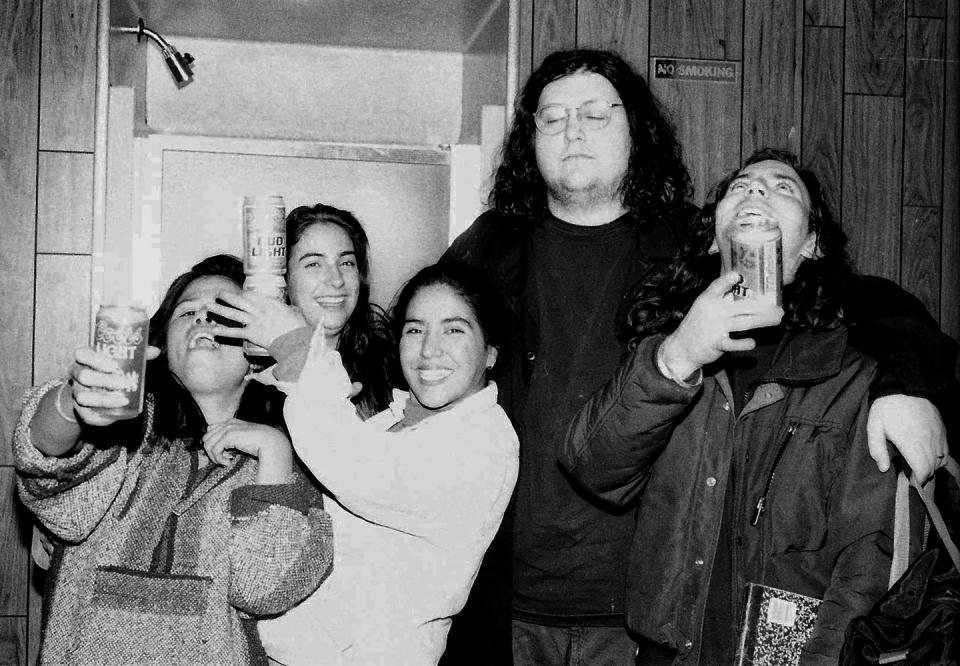 <p>Van Conner, bassist of Screaming Trees, keeps a watchful eye on excited fans who made their way backstage to see Eddie Vedder (R) after Rock for Choice concert at the Hollywood Palladium on January 23, 1993 in Los Angeles.</p>