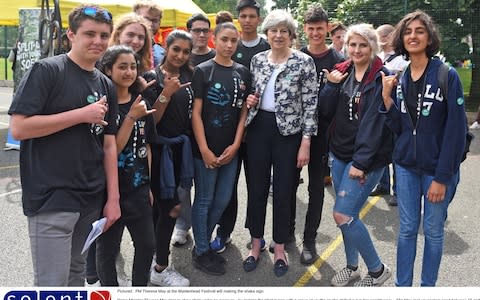 Theresa May with NCS students earlier this year - Credit: Solent News & Photo Agency/Solent News & Photo Agency