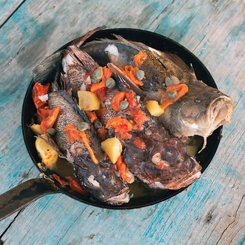 Giotta (red scorpion fish or gurnard pan-cooked with potatoes, capers and tomato) - Credit: Jasper Fry