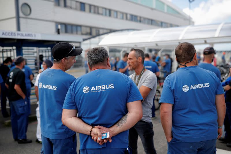 Airbus employees gather outside the Airbus facility in Montoir-de-Bretagne near Saint-Nazaire