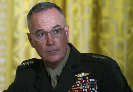 FILE PHOTO - U.S. Joint Chiefs Chairman General Joseph Dunford attends a meeting of the National Space Council in the East Room of the White House in Washington, U.S., June 18, 2018. REUTERS/Leah Millis