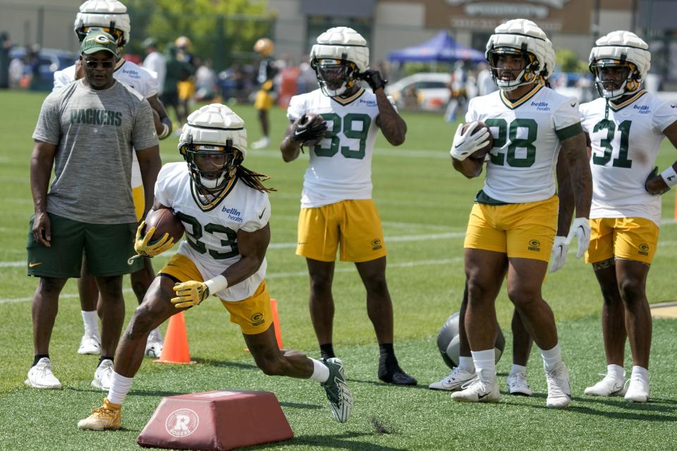 Green Bay Packers' Aaron Jones runs during NFL football training camp Thursday, July 27, 2023, in Green Bay, Wis. (AP Photo/Morry Gash)