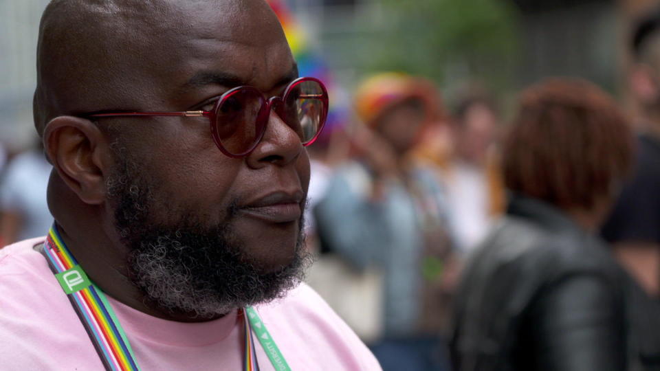 Sean Ebony Coleman, Founder & CEO of Destination Tomorrow LGBTQ center, watches a performance at Bronx Pride Fest in New York City. / Credit: CBS News