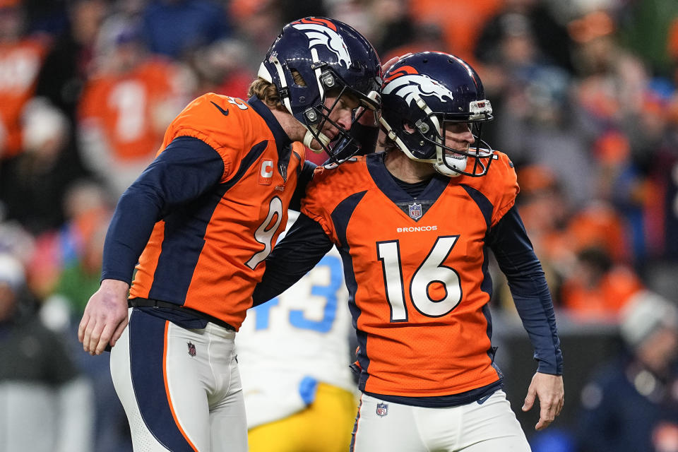 Denver Broncos's Wil Lutz (16) and Riley Dixon (9) celebrate a field goal against the Los Angeles Chargers during the second half of an NFL football game, Sunday, Dec. 31, 2023, in Denver. (AP Photo/Jack Dempsey)