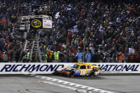 RICHMOND, VA - APRIL 28: Kyle Busch, driver of the #18 M&M's Ms. Brown Toyota, crosses the finish line to win the NASCAR Sprint Cup Series Capital City 400 at Richmond International Raceway on April 28, 2012 in Richmond, Virginia. (Photo by Drew Hallowell/Getty Images)