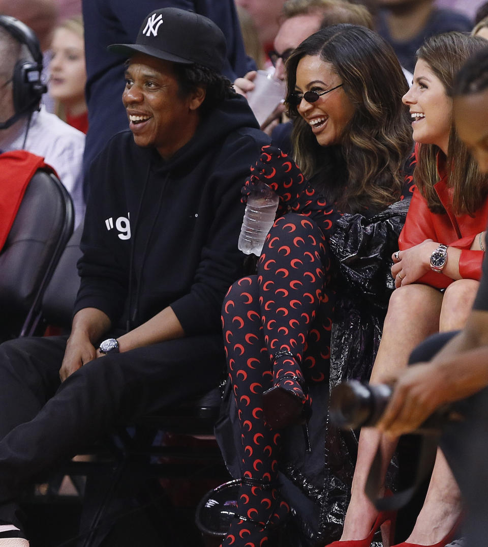 Jay-Z and Beyonce watch from courtside during Game Six of the Western Conference Semifinals of the 2019 NBA Playoffs at Toyota Center on May 10, 2019 in Houston, Texas. (Photo by Bob Levey/Getty Images)