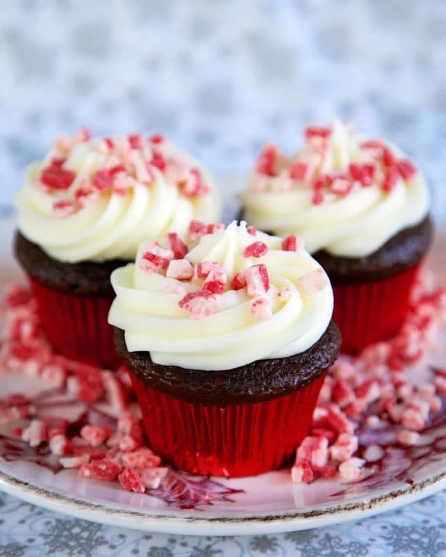 <p>Plain Chicken</p><p>What is the surprise you ask? A delicious peppermint cake ball baked in the middle of a chocolate cupcake.</p><p><strong>Get the recipe: <a href="https://www.plainchicken.com/peppermint-surprise-cupcakes/" rel="nofollow noopener" target="_blank" data-ylk="slk:Peppermint Surprise Cupcakes;elm:context_link;itc:0;sec:content-canvas" class="link ">Peppermint Surprise Cupcakes</a></strong></p>
