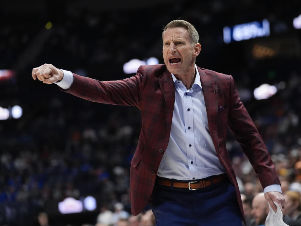 Alabama head coach Nate Oats yells at an official during the first half of an NCAA college basketball game against Florida at the Southeastern Conference tournament Friday, March 15, 2024, in Nashville, Tenn. (AP Photo/John Bazemore)