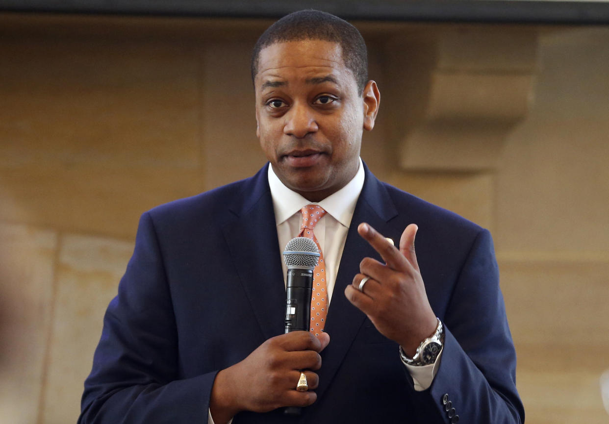 FILE- In this Sept. 25, 2018, file photo, Virginia Lt. Gov. Justin Fairfax gestures during remarks before a meeting of the Campaign to reduce evictions at a church meeting room in Richmond, Va. A California woman has accused Fairfax of sexually assaulting her 15 years ago, saying in a statement Wednesday, Feb. 6, 2019, that she repressed the memory for years but came forward in part because of the possibility that Fairfax could succeed a scandal-mired governor. (AP Photo/Steve Helber)