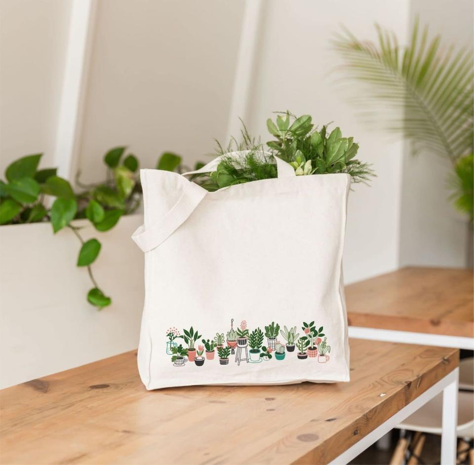 <p>This <span>Plant Tote Bag</span> ($19) will be their go-to for casual hangs, grocery runs, or coffee walks. It will speak to their love of plants and their passion for preserving the environment.</p>