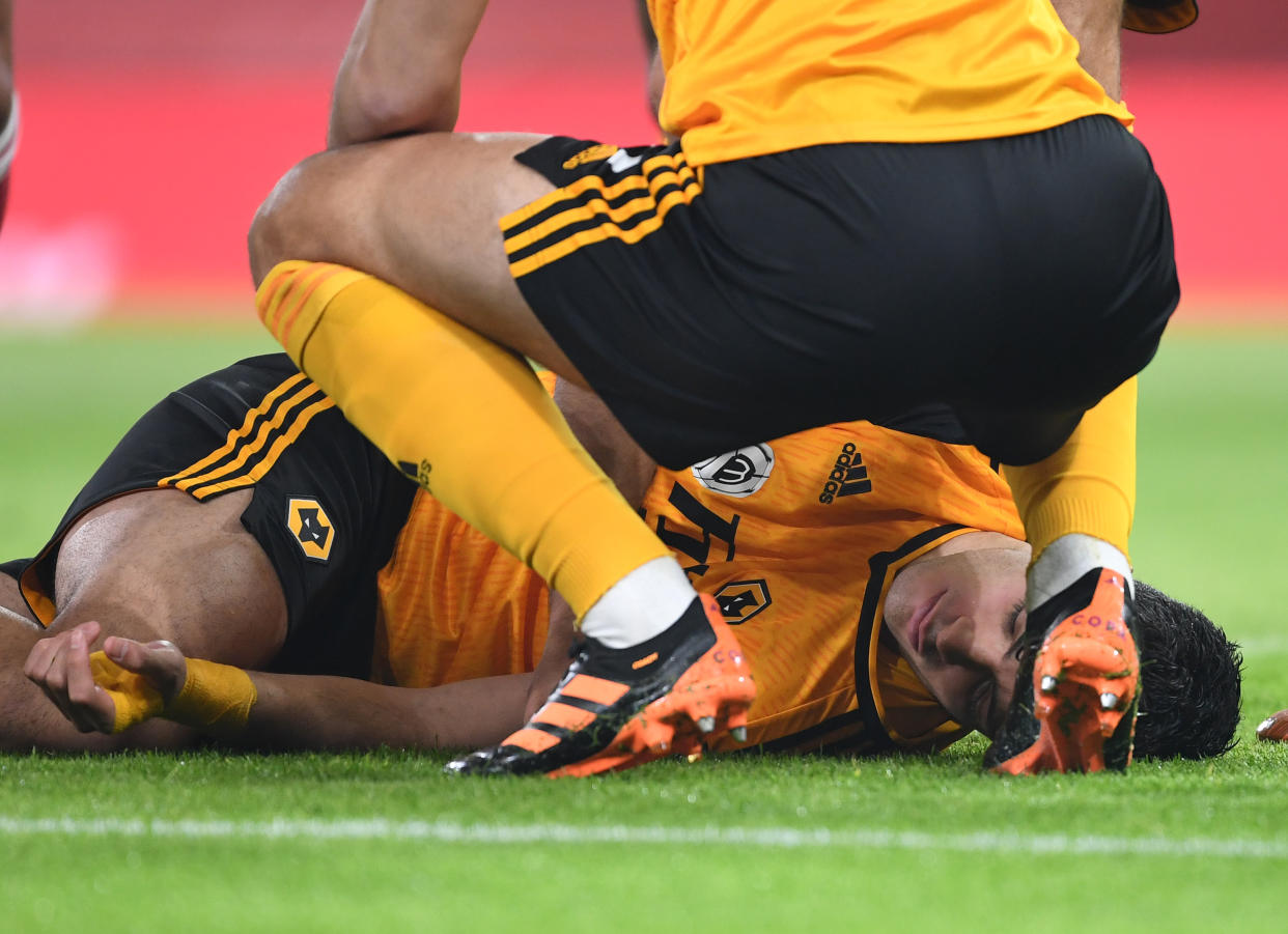 LONDON, ENGLAND - NOVEMBER 29: Raul Jimenez of Wolves injured on the pitch during the Premier League match between Arsenal and Wolverhampton Wanderers at Emirates Stadium on November 29, 2020 in London, England. Sporting stadiums around the UK remain under strict restrictions due to the Coronavirus Pandemic as Government social distancing laws prohibit fans inside venues resulting in games being played behind closed doors. (Photo by David Price/Arsenal FC via Getty Images)