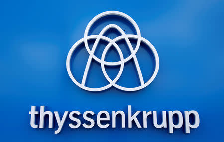 FILE PHOTO: Thyssenkrupp's logo is seen close to the elevator test tower in Rottweil, Germany, September 25, 2017. REUTERS/Michaela Rehle/File Photo