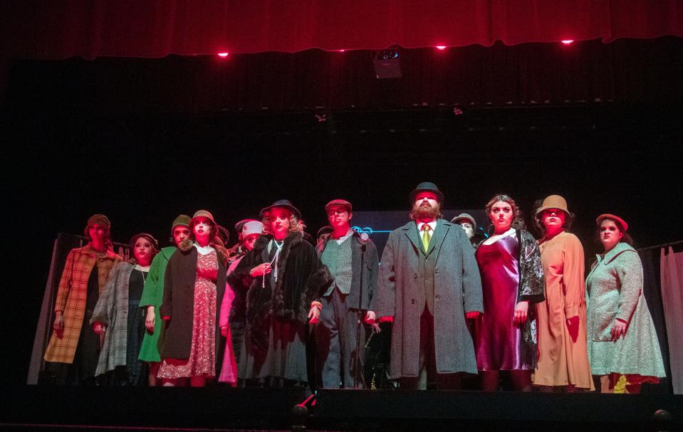 The cast of the University of the Pacific's production of "The Threepenny Opera" perform a scene at the Faye Spanos Concert Hall.