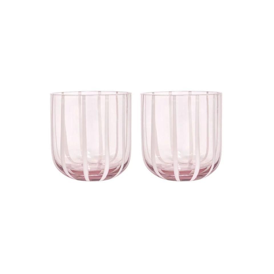 a pair of pink drinking glasses