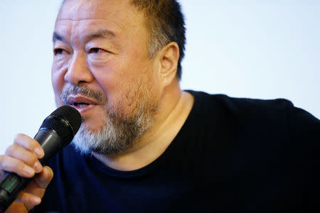 Chinese artist and free-speech advocate Ai Weiwei attends a news conference ahead of an exhibition titled "Ai Weiwei: By the way, it's always the others" at the Musee Cantonal des Beaux Arts in Lausanne, Switzerland September 20 2017. REUTERS/Pierre Albouy