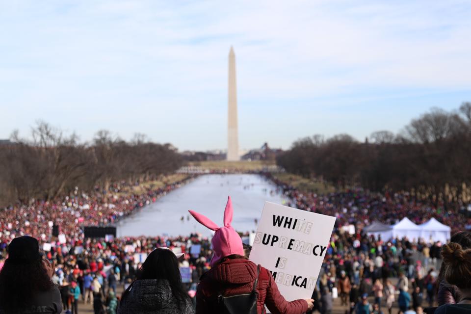 <p>People gather at the Lincoln Memorial reflecting pool to rally before the Women’s March on Jan. 20, 2018 in Washington, D.C. (Photo: Alex Wroblewski/Getty Images) </p>