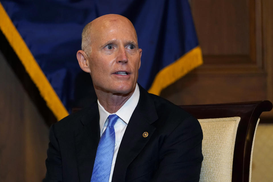 Sen. Rick Scott, R-Fla., answers a reporter's question as he meets with Judge Amy Coney Barrett, President Donald Trump's nominee for the U.S. Supreme Court, on Capitol Hill in Washington, Tuesday, Sept. 29, 2020. (AP Photo/Susan Walsh, Pool)