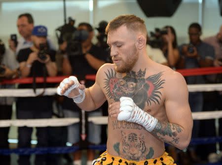 Aug 11, 2017; Las Vegas, NV, USA; Conor McGregor warms up in the ring during a media workout in preparation for his fight against Floyd Mayweather, Jr. at UFC Performance Institute. Mandatory Credit: Joe Camporeale-USA TODAY Sports