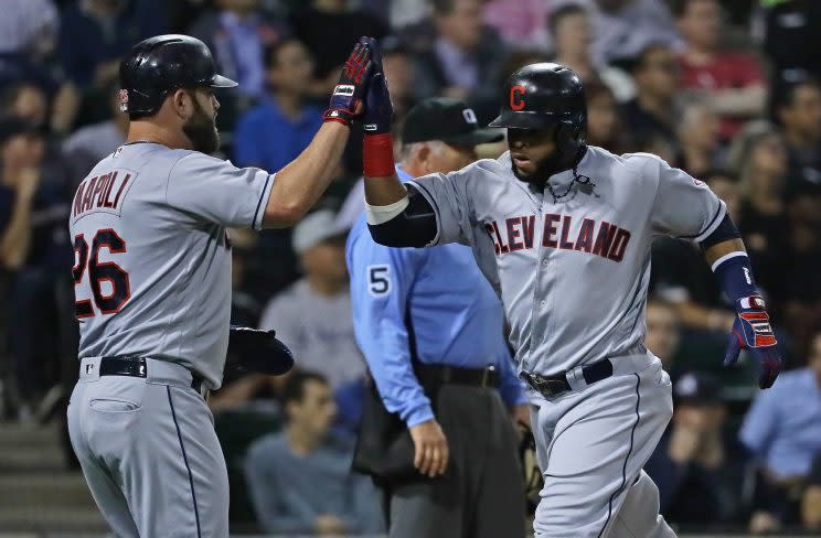 Carlos Santana and Mike Napoli have posted big comeback seasons with the Indians. (Getty Images/Jonathan Daniel)