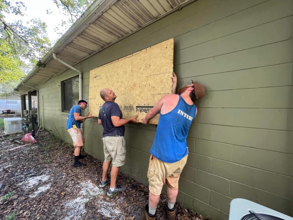 Images shares online showed vounteers boarding up structures at the rescue (@bigcatrescue/Facebook)