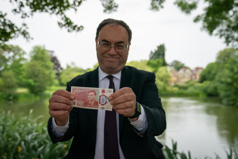 Governor of the Bank of England Andrew Bailey with the new £50 note which features Alan Turing, at Bletchley Park in Milton Keynes, England. Photo: PA