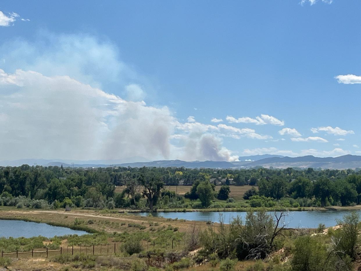 Smoke can be seen in Northern Colorado from a wildfire burning outside of Lyons in Boulder County on July 30, 2024.