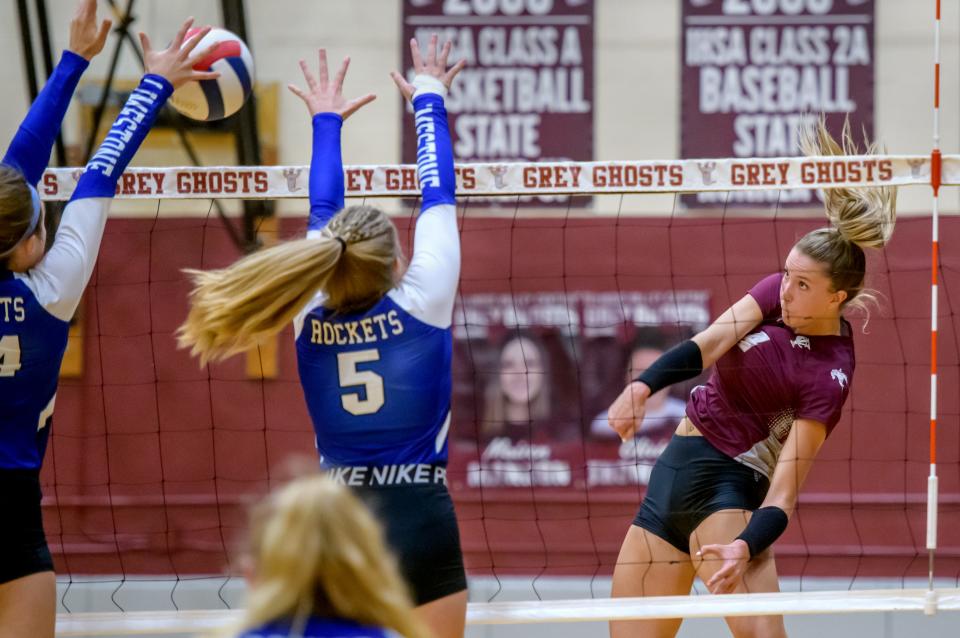 IVC's Kenna Wollard puts the ball between Limestone's Ella Karmenzind, far left, and Phoebe Sewell during their volleyball match Wednesay, Aug. 31, 2022 in Chillicothe.