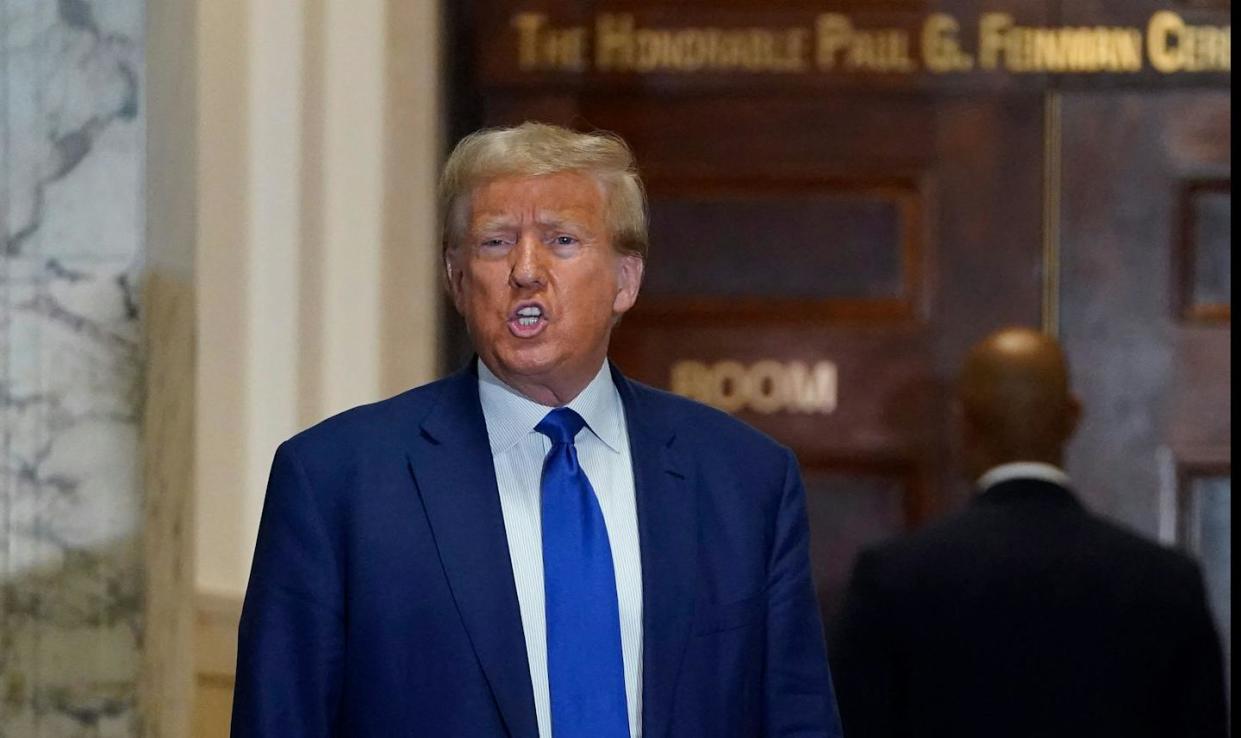 Donald Trump attends his civil fraud trial in New York City on Oct. 25, 2023. <a href="https://www.gettyimages.com/detail/news-photo/former-us-president-donald-trump-speaks-to-the-media-as-he-news-photo/1744991475?adppopup=true" rel="nofollow noopener" target="_blank" data-ylk="slk:Timothy A. Clary/AFP via Getty Images;elm:context_link;itc:0;sec:content-canvas" class="link ">Timothy A. Clary/AFP via Getty Images</a>