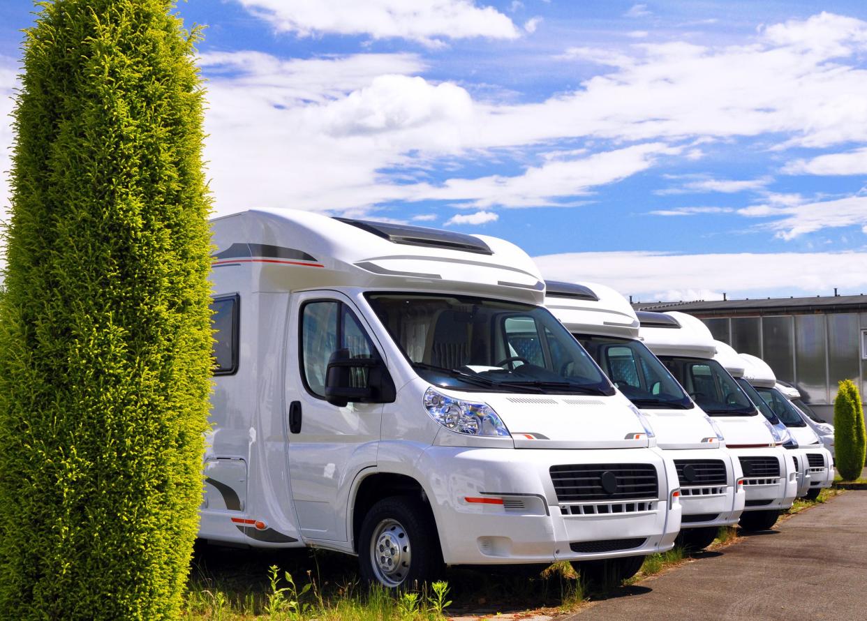 Newly produced motorhomes on a car park in a vehicle factory