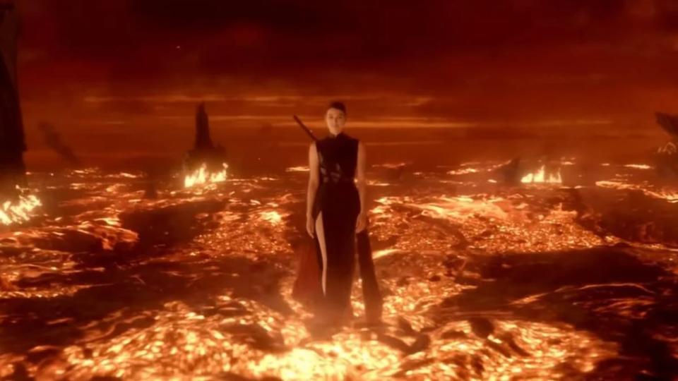 A woman walks across a fiery landscape in a still from Netflix's "3 Body Problem"