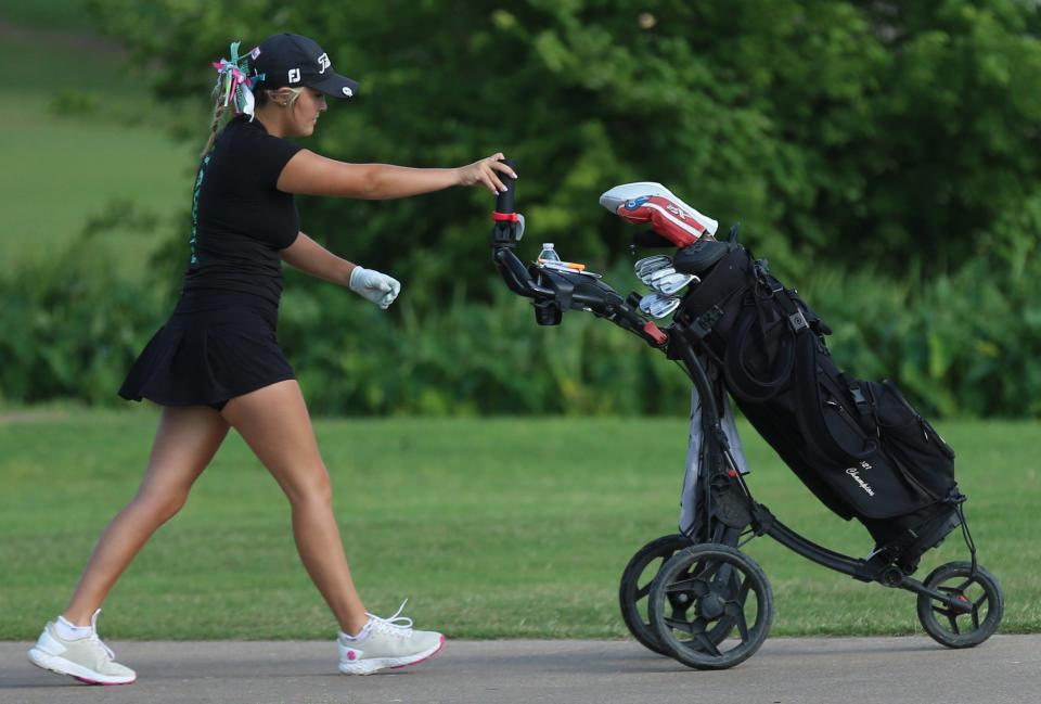 Wall High School's Corbyn Herring heads to the next hole during the final round of the UIL Class 3A Girls State Golf Tournament at Jimmy Clay Golf Course in Austin on Tuesday, May 17, 2022.