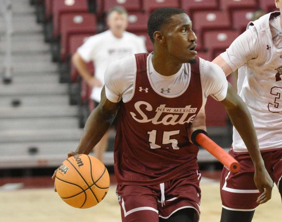 Mike Peake dribbles during a drill on New Mexico State's first day of men's basketball practice Sept. 27. Peake was shot during an incident on the University of New Mexico campus on Saturday, Nov. 19, 2022.