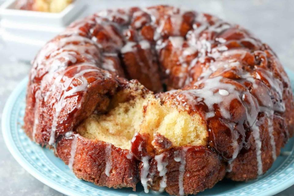 <p>Boston Girl Bakes</p><p>This Cinnamon Monkey Bread from scratch is going to become your sinful go to brunch treat. Fluffy pull apart sweet bread rolls dipped in butter, rolled in cinnamon and sugar and drizzled with a vanilla glaze.</p><p><strong>Get the recipe: <a href="https://www.bostongirlbakes.com/cinnamon-monkey-bread-from-scratch/" rel="nofollow noopener" target="_blank" data-ylk="slk:Monkey Bread from Scratch;elm:context_link;itc:0;sec:content-canvas" class="link ">Monkey Bread from Scratch</a></strong></p>