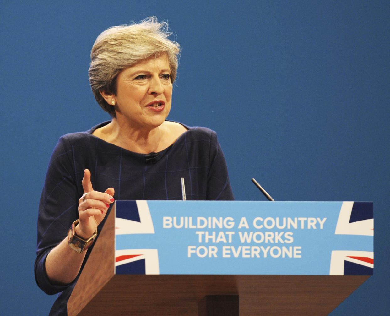 Conservative Party Leader and Prime Minister Theresa May addresses delegates during a speech at the Conservative Party Conference at Manchester Central, in Manchester, England, Wednesday, Oct. 4, 2017. (AP Photo/Rui Vieira)