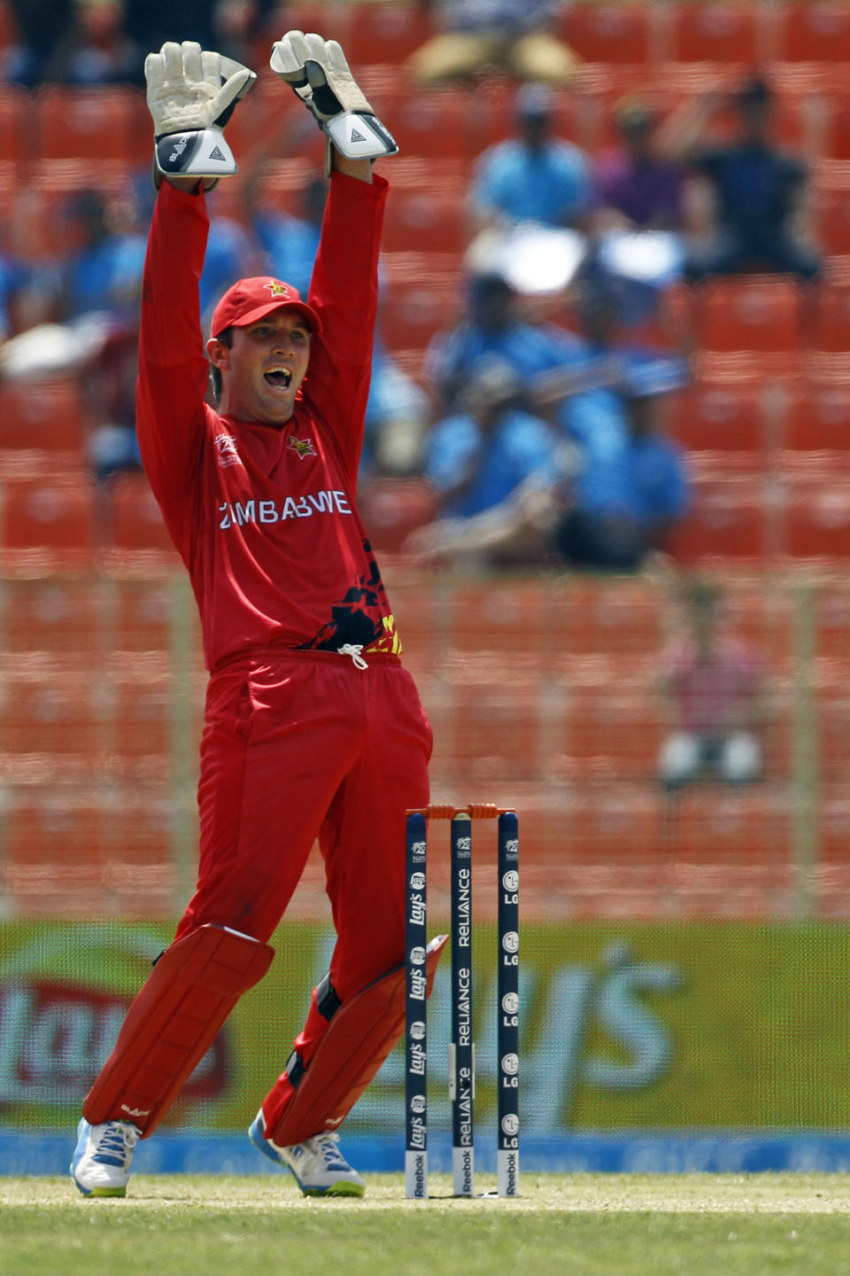 Zimbabwe's captain Brendan Taylor successfully appeals for the dismissal of United Arab Emirates' Swapnil Patil during their ICC Twenty20 Cricket World Cup match in Sylhet, Bangladesh, Friday, March 21, 2014. (AP Photo/A.M. Ahad)