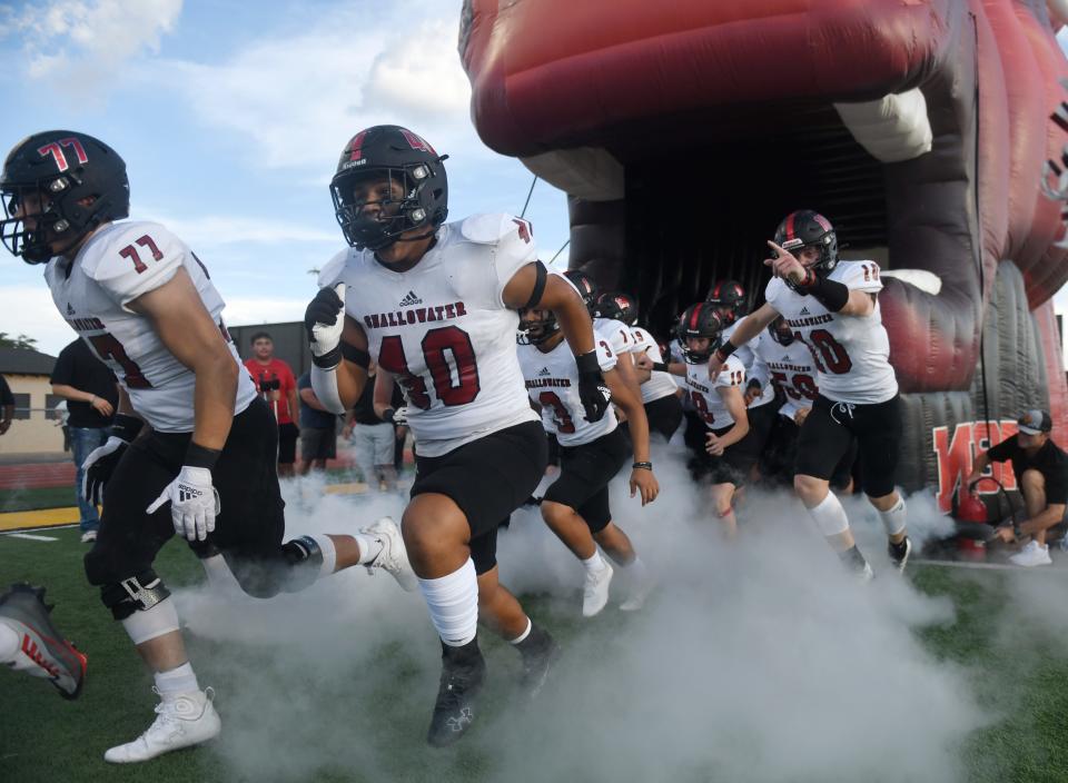 Shallowater runs on to the field before their game against Seminole, Friday, Sept. 2, 2022, at Wigwam Stadium in Seminole. 