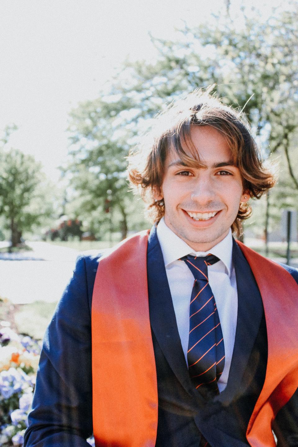 Lane Wolf graduated in May from Indiana University-Bloomington with a bachelor's in media. He planned to move to Los Angeles, but now works in a homeless shelter for people exposed to COVID-19.