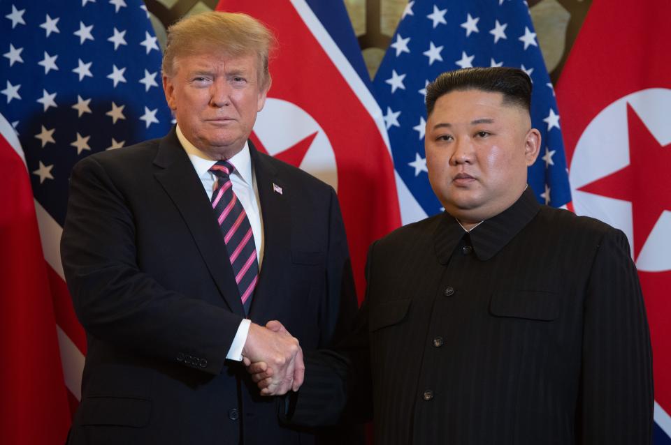 US President Donald Trump shakes hands with North Korea's leader Kim Jong Un before a meeting at the Sofitel Legend Metropole hotel in Hanoi on February 27, 2019.