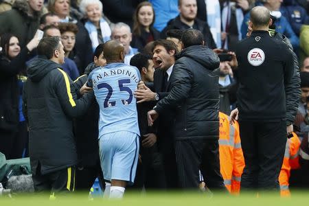 Britain Football Soccer - Manchester City v Chelsea - Premier League - Etihad Stadium - 3/12/16 Manchester City's Fernandinho clashes with Chelsea manager Antonio Conte after being sent off Action Images via Reuters / Jason Cairnduff Livepic